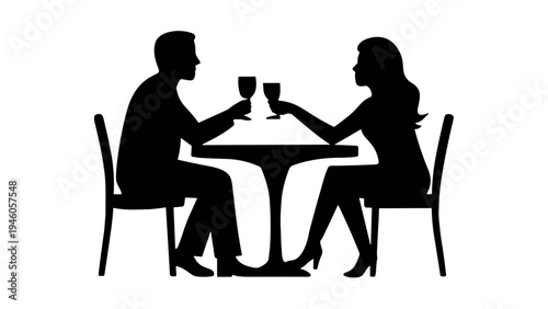 Silhouette of romantic couple having dinner at restaurant