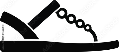 Black silhouette of a stylish summer flat sandal with decorative circular patterns and a back strap