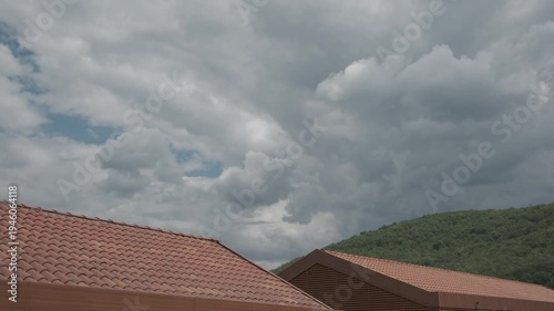 clouds over the roof