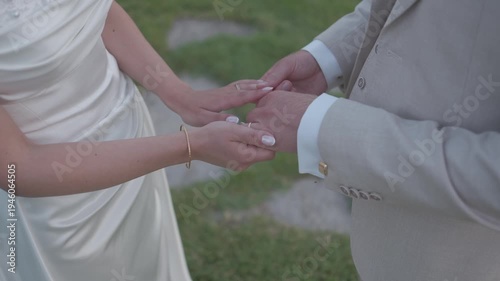 bride and groom holding hands