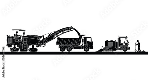 Silhouette of road construction vehicles and worker