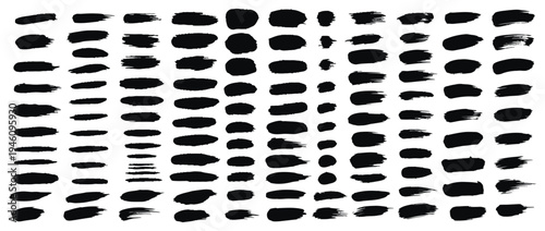 A black and white image featuring a dense pattern of irregularly shaped black spots