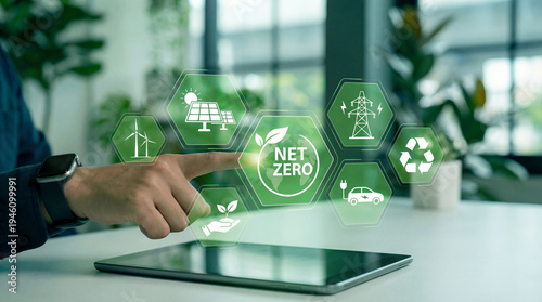 Net Zero Concept with Hand Touching Tablet and Sustainability Icons