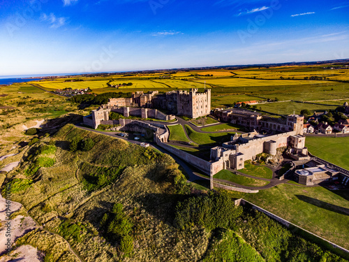 Bild auf Leinwand Bamburgh Castle, a striking medieval fortress located on the coast of Northumberland, England