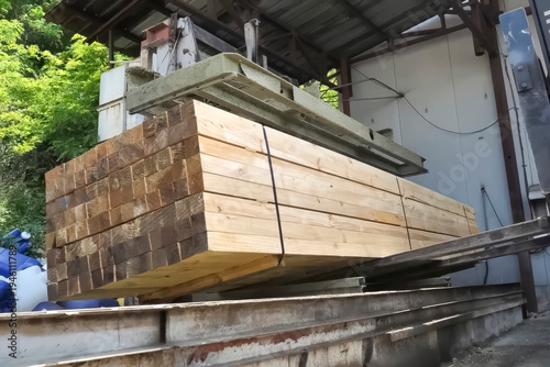 Moving sawn boards for washing and, subsequent storage.