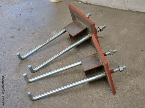 Принти на полотні custom-made heavy-duty steel anchor bolts, specifically the L-shaped type used for concrete 
foundations