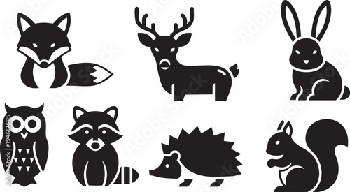 Black silhouettes of forest animals on white background including fox deer rabbit