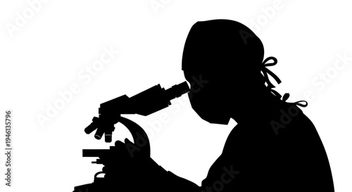Silhouette A silhouette of a scientist examining a sample under a microscope in a laboratory setting