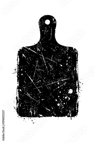 Black scratched cutting board with handle on white background