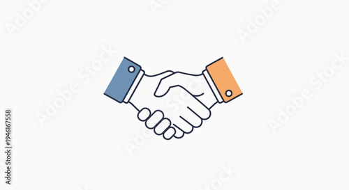 Two businesspeople shaking hands in a formal agreement