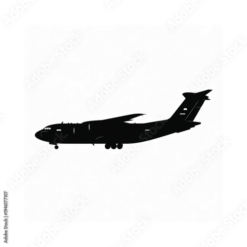 Silhouette of a large military transport aircraft against a white background