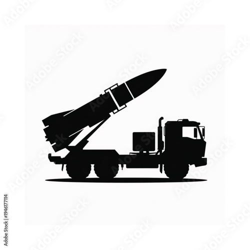 Silhouetted missile launcher mounted on a military transport truck