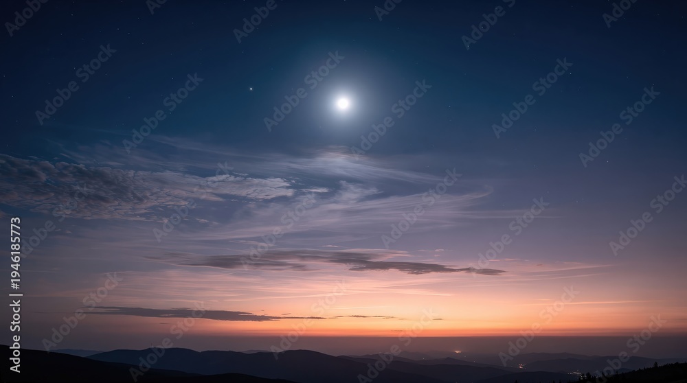Obraz premium A serene twilight sky with clouds, stars, and a bright moon over dark mountain silhouettes.