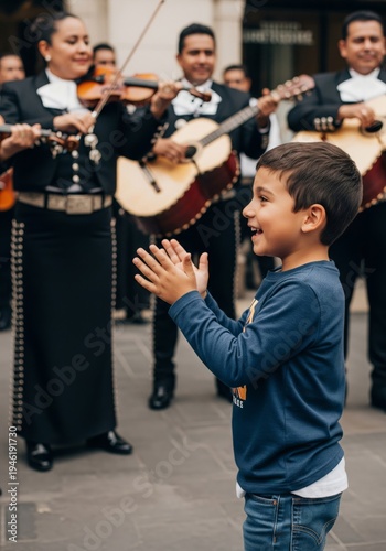 Joyful Boy Clapping Hands Listening Mariachi Band in Black Attire