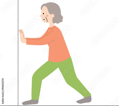 壁に手をついて筋力トレーニングをする高齢女性