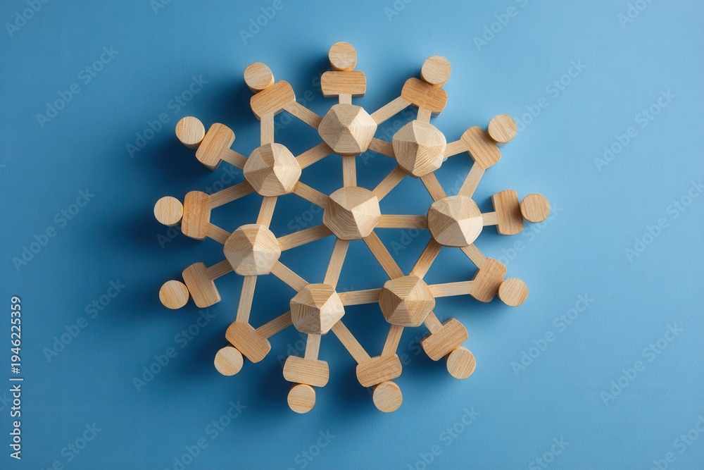 Obraz premium Geometric Snowflake on Blue: A meticulously crafted geometric snowflake sits gracefully against a serene blue backdrop, creating a visual symphony of precise angles and delicate form.