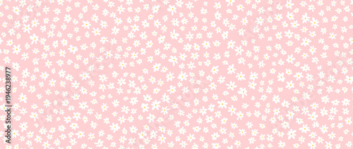 Small white flower seamless pattern on pink background. Cute hand drawn ditzy floral repeated wallpaper. Vector romantic blossom motif for textile print, fabric swatch, dress ornament, wrapping paper