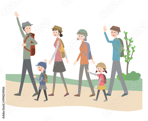 登山道を歩いている三世代家族