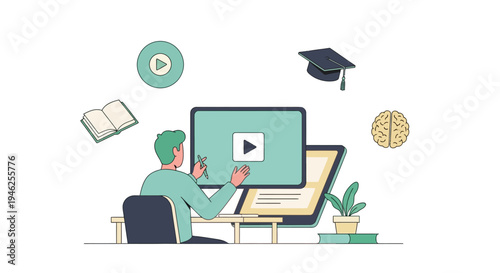 A man watches an educational video on his computer while sitting at a desk with books and a plant nearby indoors.