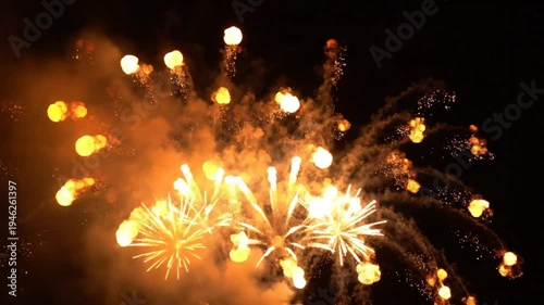 Wallpaper Mural Bright golden fireworks display illuminating the dark night sky with explosions and trails for celebrations Torontodigital.ca