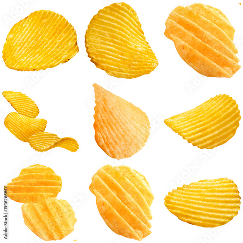 Assortment of crispy wavy potato chips, golden yellow and orange, some stacked, isolated on transparent background.