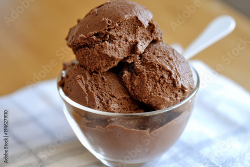 Rich Dark Chocolate Ice Cream Scoops In A Glass Bowl