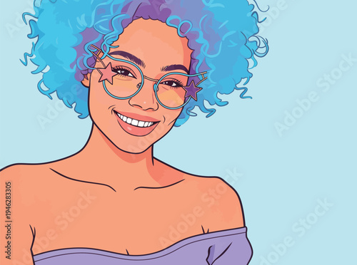 A woman with blue curly hair and star-shaped glasses smiles widely. She has a relaxed pose and a light blue backdrop.