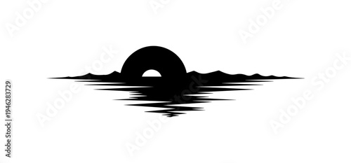 Silhouette of a serene ocean sunset with silhouette