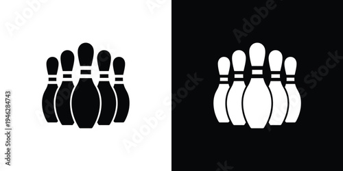 A set of ten white bowling pins standing in a triangular formation on a black background