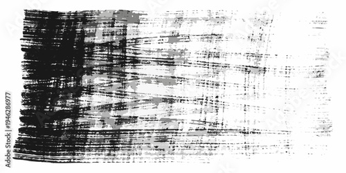 Abstract brushstrokes creating a textured monochrome background pattern