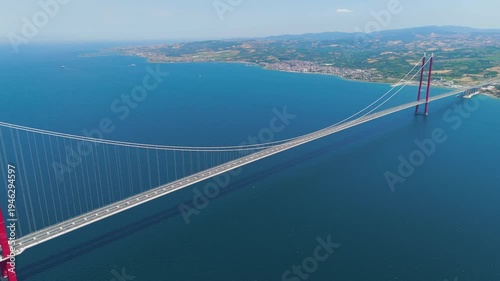 Wallpaper Mural Lapseki, Turkey. Wide aerial view of 1915 Canakkale Bridge with moving cars, the town of Lapseki and the Dardanelles waters. Aerial View Torontodigital.ca