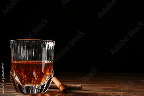 Glass of cold whiskey and c...