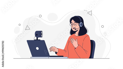 Young woman with headset and laptop, online communication, video call, remote work