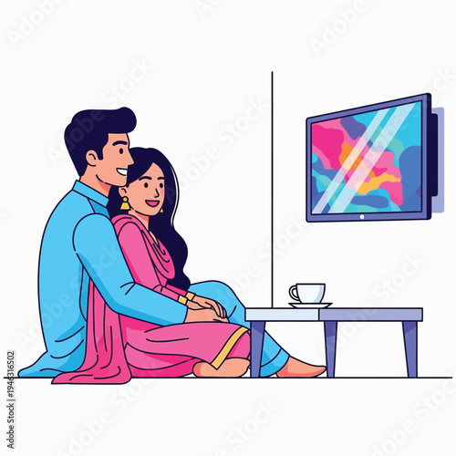Pakistani or indian couple watching television at home, south asian man and woman relaxing together