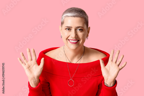 Happy mature blonde woman w...