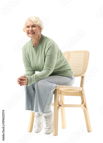 Senior woman sitting in cha...