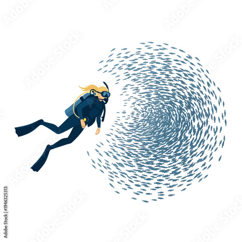 Scuba diver swimming near a swirling school of fish in clear blue water