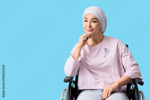 Young woman in wheelchair a...