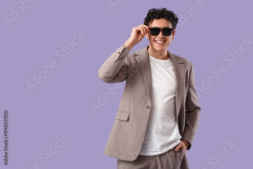 Handsome young man in styli...