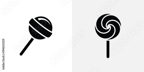 Two black and white lollipops on sticks with different patterns