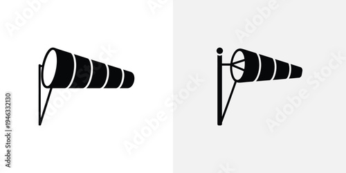 Two black and white striped windmill with different orientations