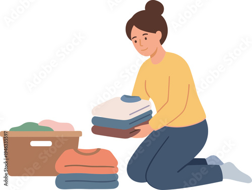 Woman kneels beside a box holding folded clothes and stacking more