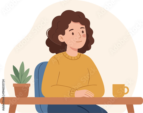 Woman sitting at a desk with a plant and coffee cup
