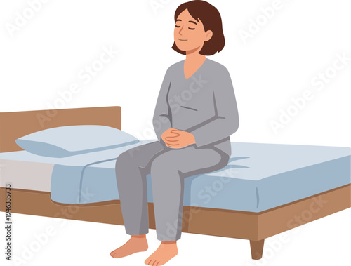 A woman sits on the edge of a bed in a bedroom setting.