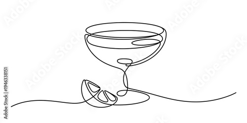 Continuous line drawing of cocktail glass with lemon, minimalistic art