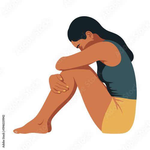 Sad woman sitting alone in contemplative mood