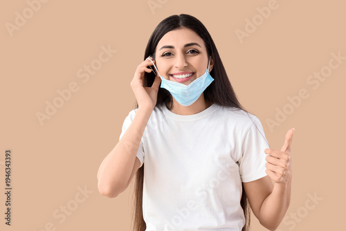 Young woman with medical ma...