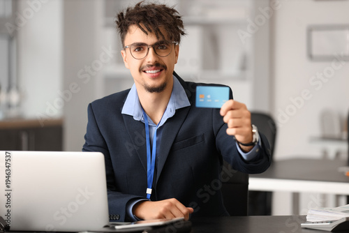 Young male bank manager wit...