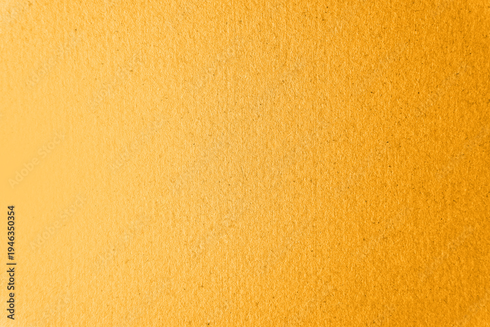 Fototapeta premium Warm fresh real yellow tone color paint on blank eco paper texture background with space minimal style