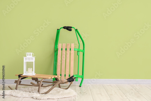 Sleds with Christmas lanter...